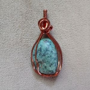 Genuine turquoise wire wrapped pendant